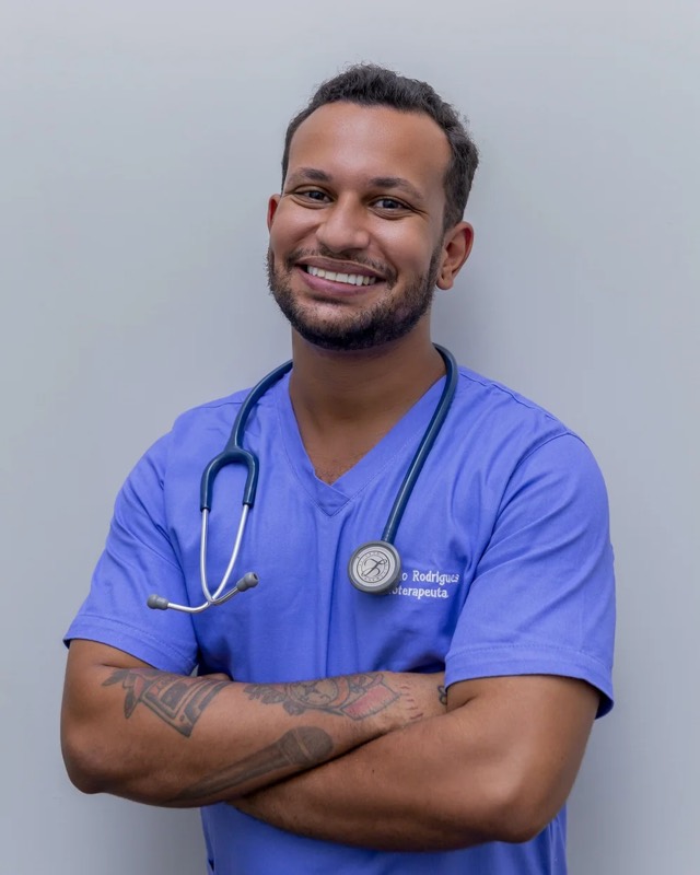 A doctor in scrubs with a stethoscope