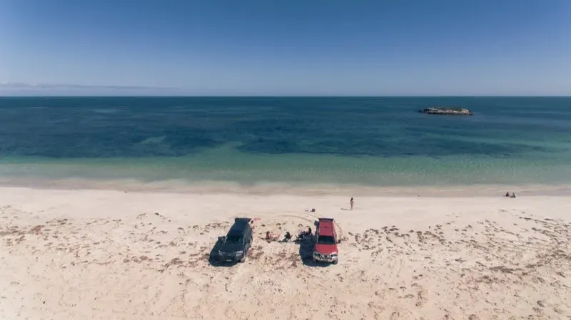 Cars parked on the beach